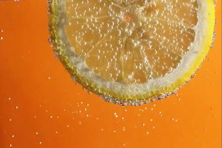 sparkling water with a slice of lemon